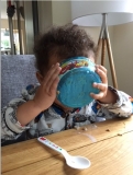 One of Tizer's young relatives eating his breakfast