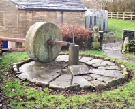 Millstone manually operated grinder