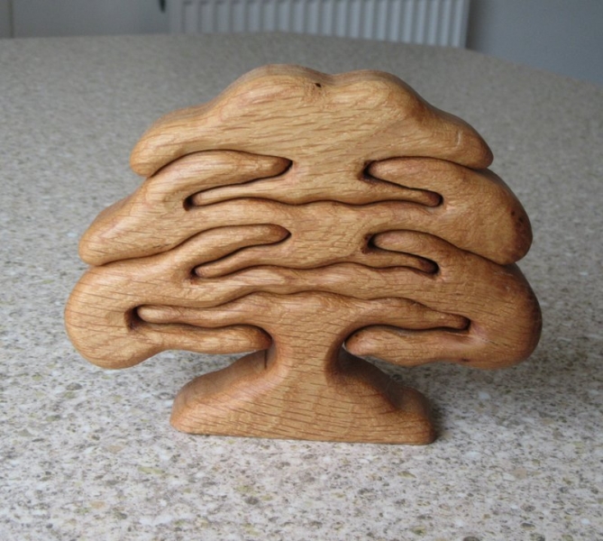 Oak tree carved in four pieces of oak