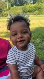 Kahra with daisies in his hair