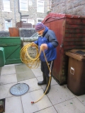 Mick coiling hose better than Susan