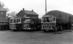 W J Riding roped and sheeted load