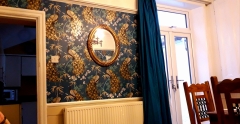 Curtain and one of the mirrors back up