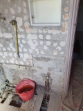 Remains of Shower and Washbasin Pipework