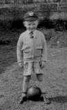 Tizer in school cap and with football