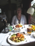 A HAPPY WOMAN SUSAN WITH DINNER